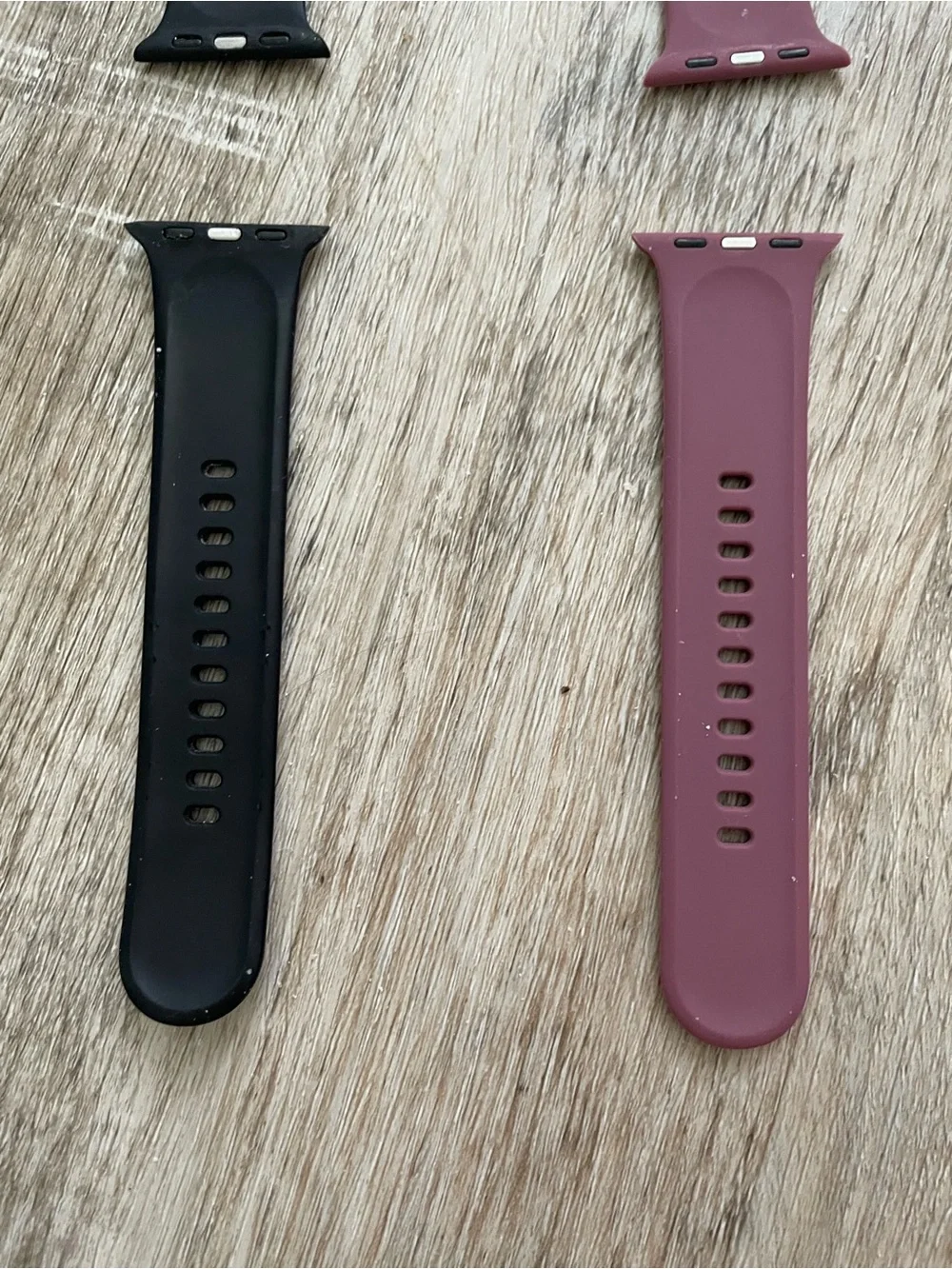 Apple Smartwatch with White, Black, and Mauve Bands